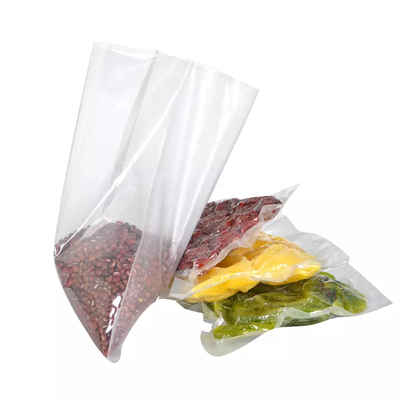 注文の印刷されたPAのPEの真空のパッキング袋は食糧プラスチック シールの貯蔵袋を浮彫りにした