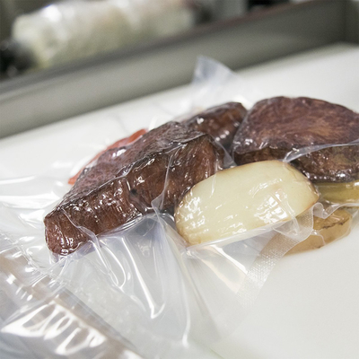 食糧Precutプラスチック真空の貯蔵は30cm*40cm OEM大型の7cm*10cmを袋に入れる