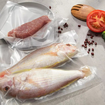 食糧救済者の注文の透明な浮彫りにされたプラスチック包装の真空のシーラー袋ロール