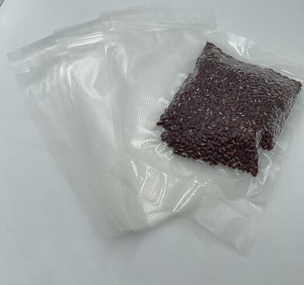 ジッパーはプラスチック ヒート シールの食糧を袋に入れる二方向パターン真空を浮彫りにした