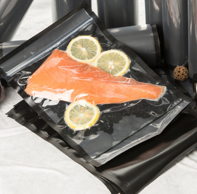 プラスチックゆとりの織り目加工の黒い真空シールは4ミルの厚さを袋に入れる