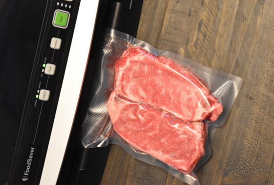 PEは肉のための真空のシーラーの食糧袋の真空の食糧袋を浮彫りにしました