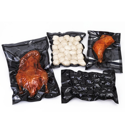 食品等級の黒のヒート シールの注文の包装の浮彫りにされた真空シール袋ロール